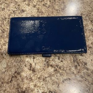 Coach navy blue checkbook cover never used!